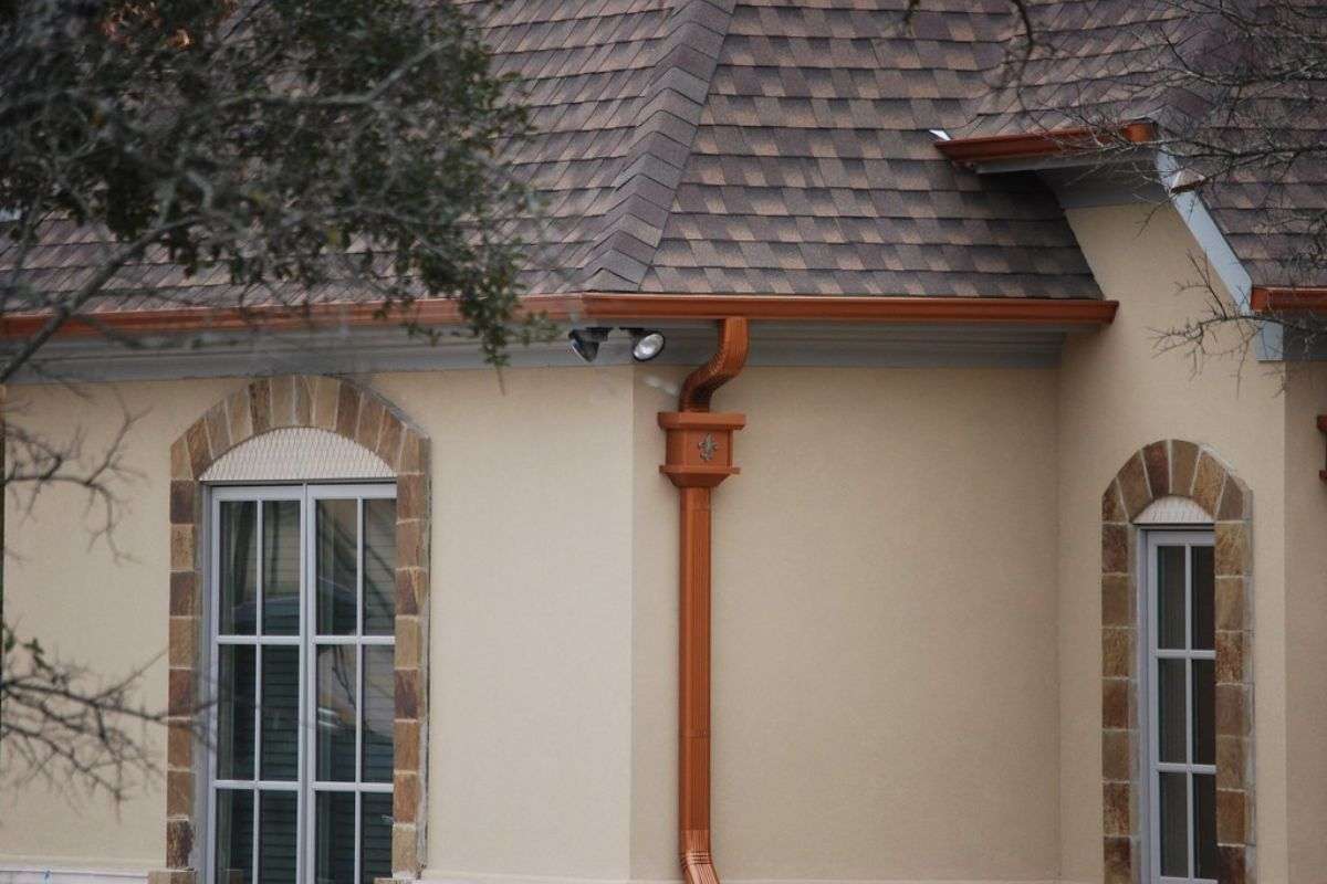 Copper gutters highlighting their durability and distinctive appearance.