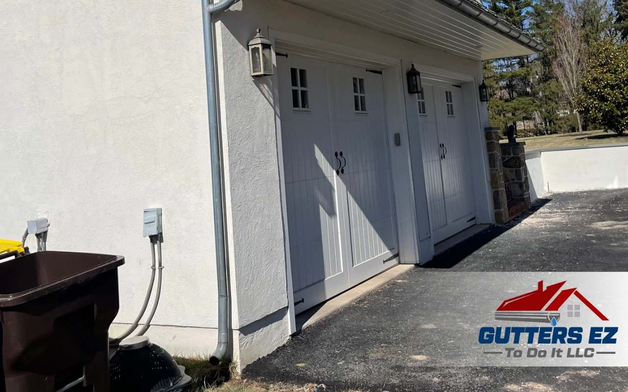 Freshly installed aluminum downspout on a home in Bala Cynwyd, PA